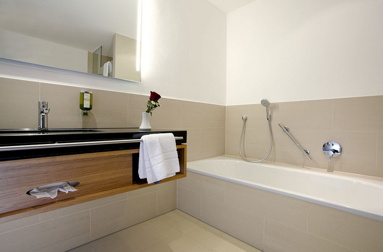 Spacious bathrooms in all rooms and suites